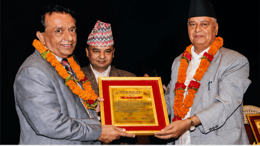 Sudhir Raj Adhikari receiving Rastriya Nagarik Gaurav Samman 2065 BS