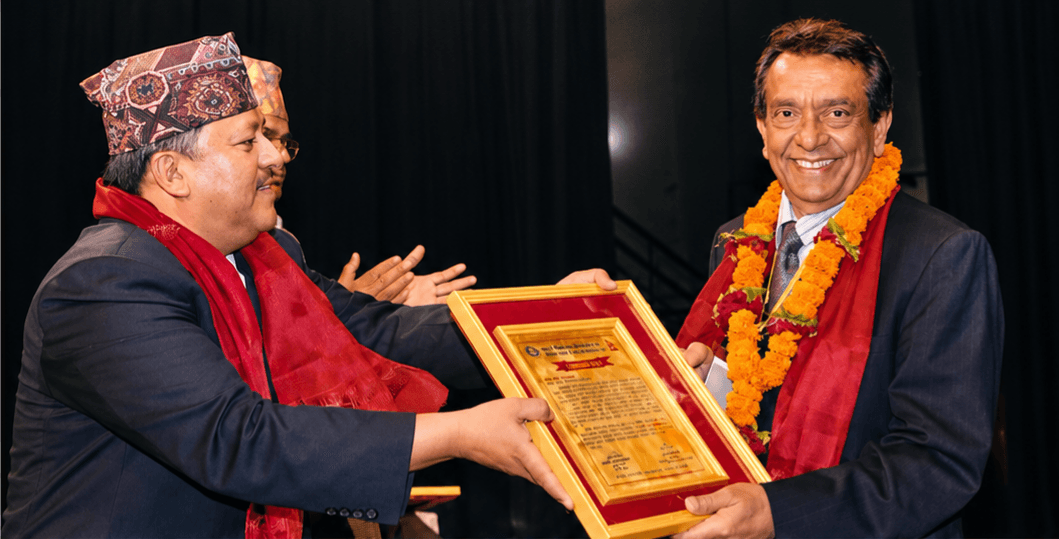Sudhir Raj Adhikari receiving Rastra Bikas Sewa Samman 2067 BS